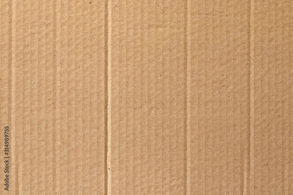 Fototapeta premium Brown cardboard sheet abstract background, texture of recycle paper box in old vintage pattern for design art work.
