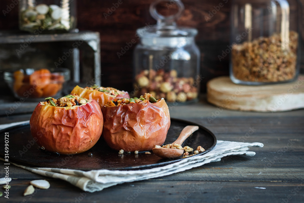 Baked apples with nut granola and pumpkin seeds. Baked apples with nut granola and pumpkin seeds.