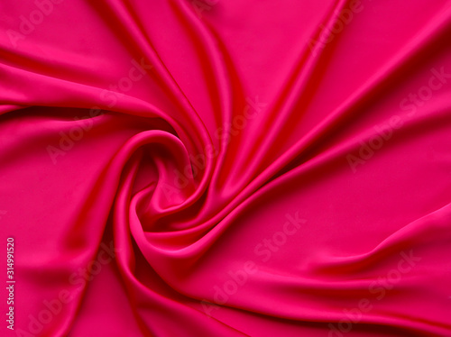 Red smooth elegant luxurious satin background texture close up - abstracted wallpaper