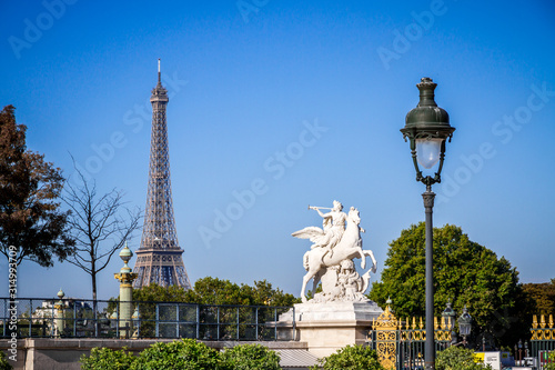 Marble statue and Eiffel Tower view from the Tuileries Garden, Paris © daboost