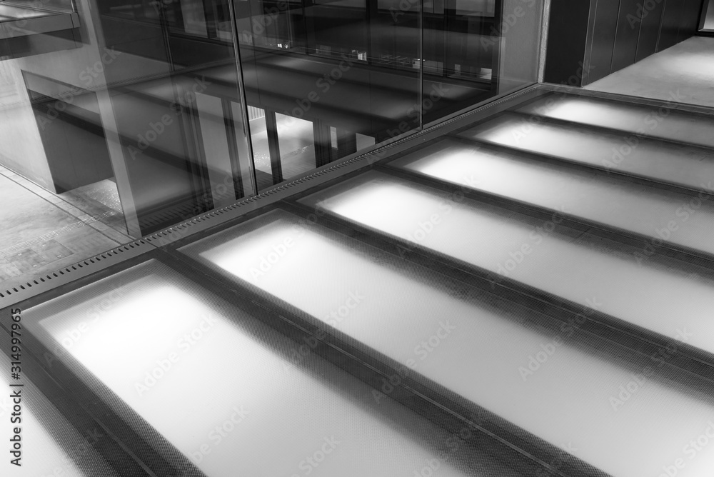 Interior view of modern pedestrian walkway. Building abstract background Interior view of modern pedestrian walkway. Building abstract background