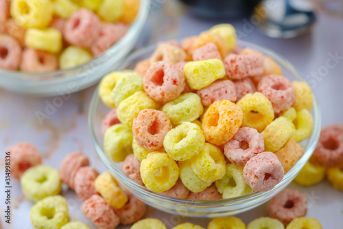 Cereal flakes in bowl with copy space,Breakfast concept.Food with delicious fruity taste and fruity colours.It's made with maize,wheat,and barley