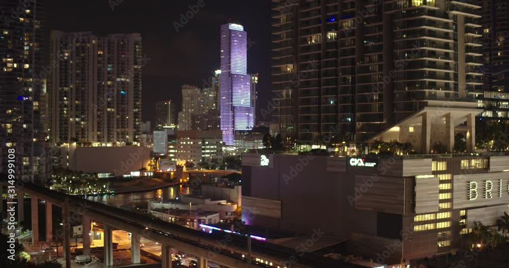 Beautiful view of a city during the night, cars driving, apartment lights, night life. Beautiful view of a city during the night, cars driving, apartment lights, night life.