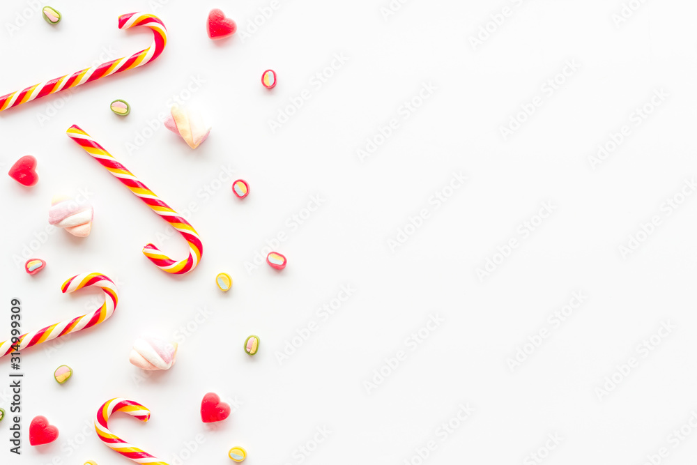 Christmas candies frame on white backgound top-down copy space Christmas candies frame on white backgound top-down copy space