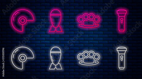 Set line Aviation bomb , Brass knuckles , Military helmet and Flashlight . Glowing neon icon on brick wall. Vector
