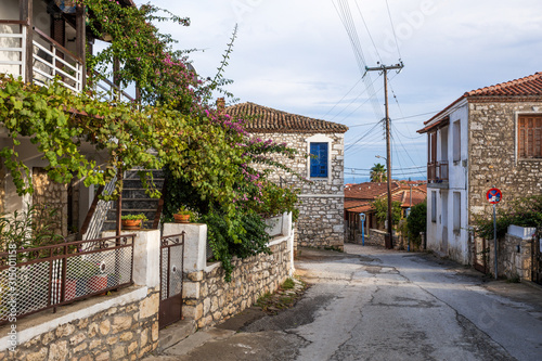 Fototapeta Naklejka Na Ścianę i Meble -  Street of small town in Greece. Horizontal color photography.