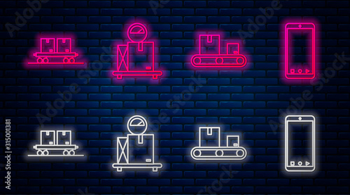 Set line Scale with cardboard box , Conveyor belt with cardboard box , Railway carriage and Mobile phone with app delivery tracking. Glowing neon icon on brick wall. Vector