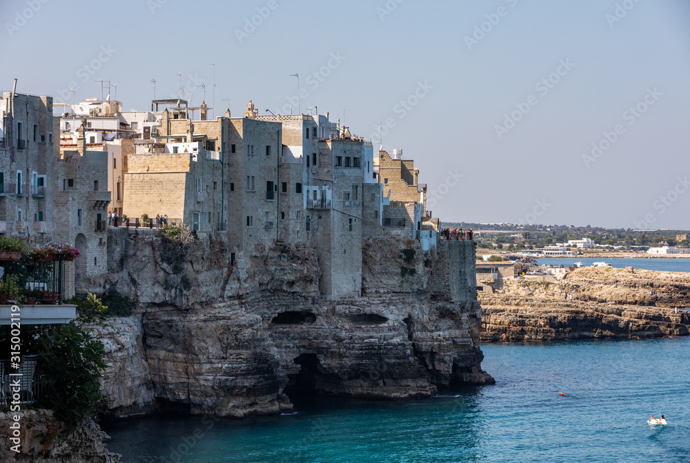 View of Polignano a mare - picturesque little town on cliffs of the Adriatic Sea. Apulia, Southern Italy