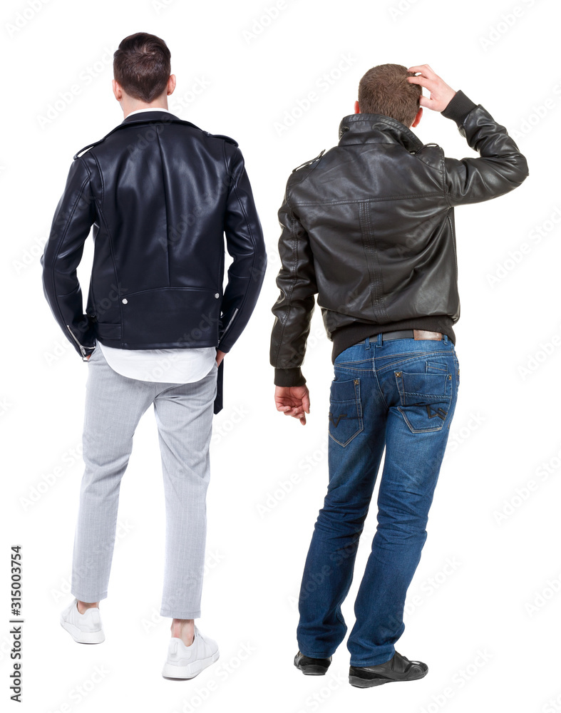 Back view of couple in winter jacket. Back view of couple in winter jacket.