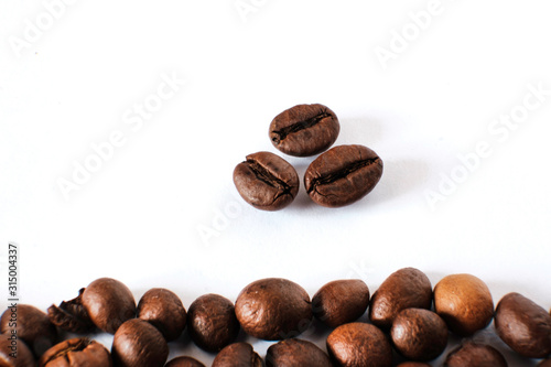 Wallpaper Mural Coffee beans lie on a white sheet of paper Torontodigital.ca