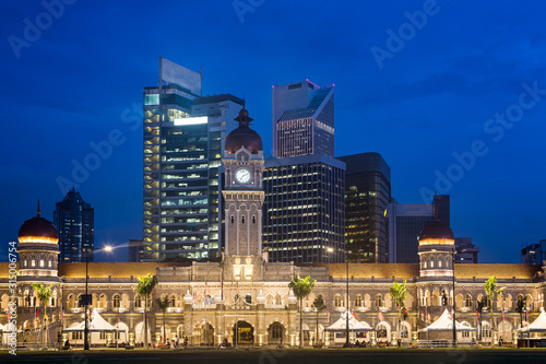 Contrast between modern office buildings and the famous Sultan Abdul Sama building in Kuala Lumpur, Malyasia capital city © jakartatravel