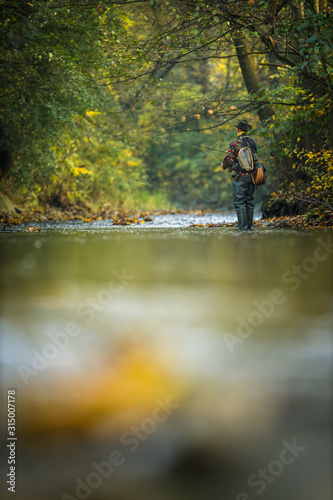 Wallpaper Mural Fly fisherman fly fishing on a splendid mountain river Torontodigital.ca