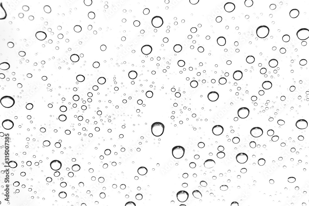 Rain drops on window glasses surface Natural Pattern of raindrops. Natural pattern of raindrops on white background for your design.