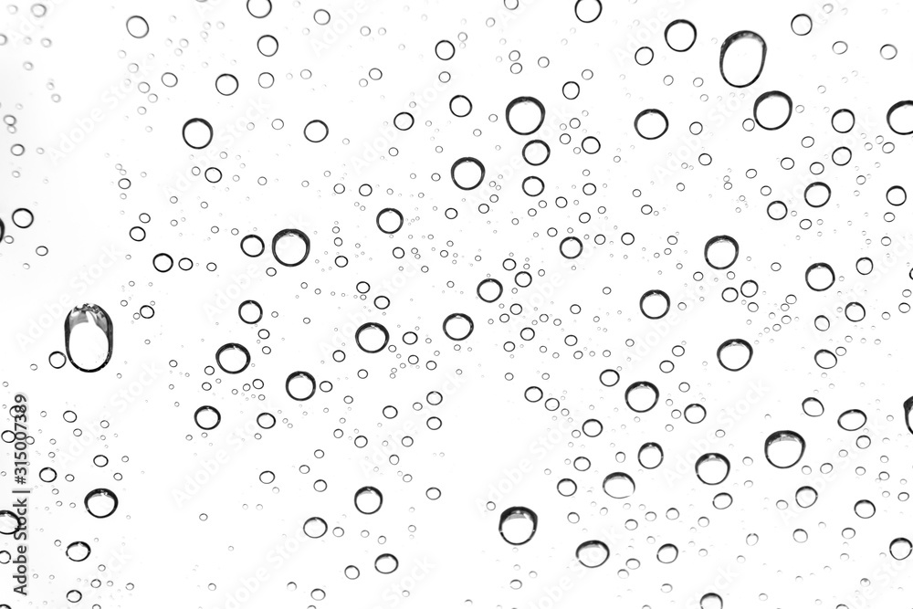 Rain drops on window glasses surface Natural Pattern of raindrops. Natural pattern of raindrops on white background for your design.