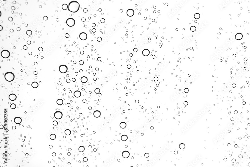 Rain drops on window glasses surface Natural Pattern of raindrops. Natural pattern of raindrops on white background for your design.