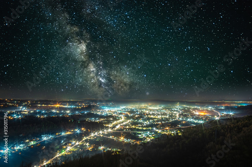 Starry sky over the night city