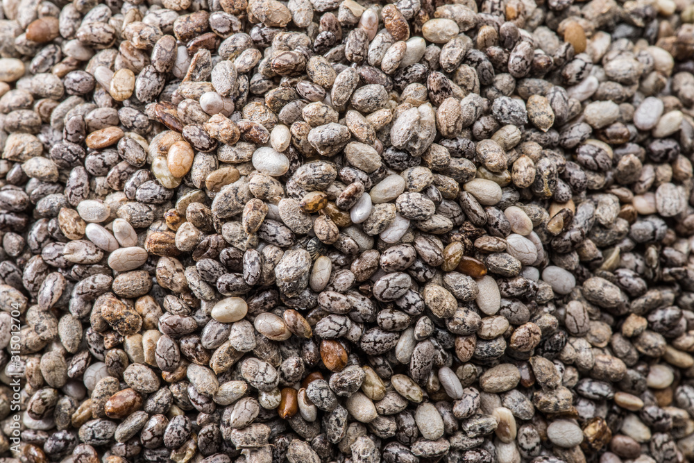 Lot of Chia seeds. Food background. Lot of Chia seeds. Food background.