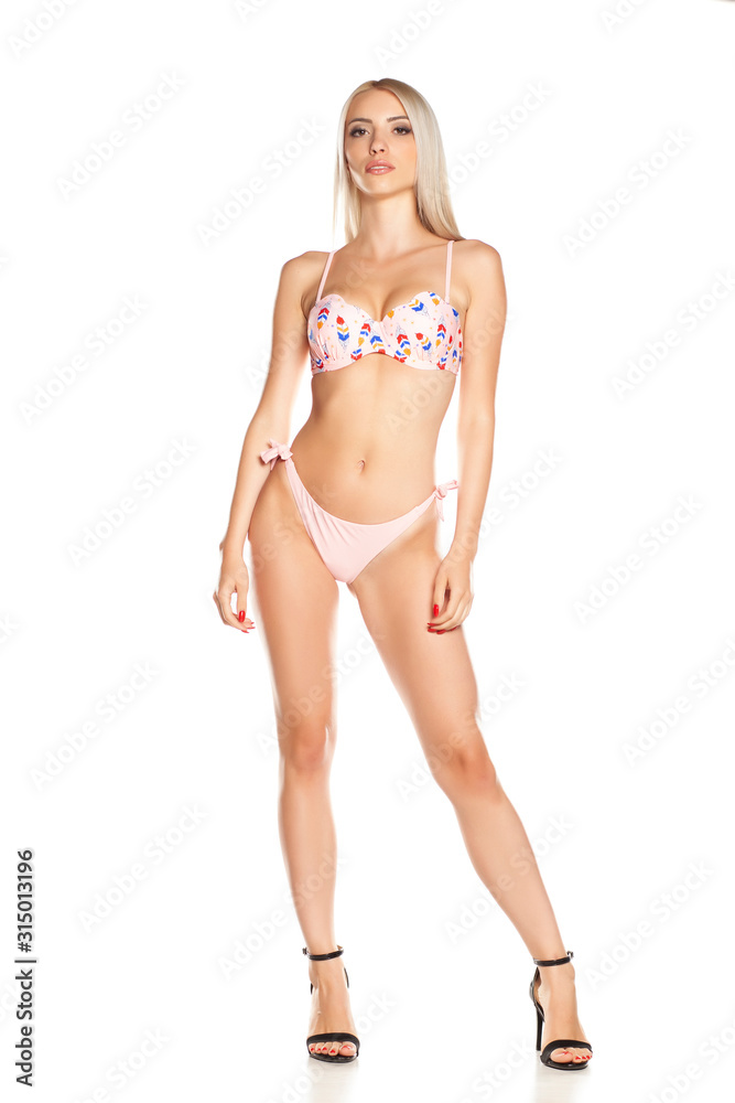 Young beautiful hot woman in bikini, isolated. Young beautiful hot woman in bikini, isolated.