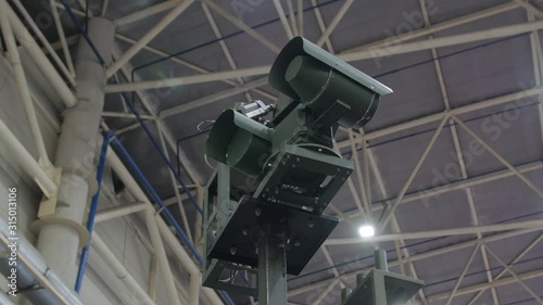 Military surveillance camera rotates radar sight aim sensor detection system guidance system