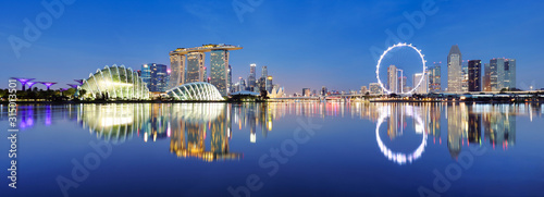 Panoramic image of Singapore skyline at night. photo