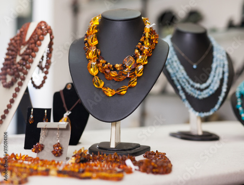 Womens jewelry from amber in a jewelry store