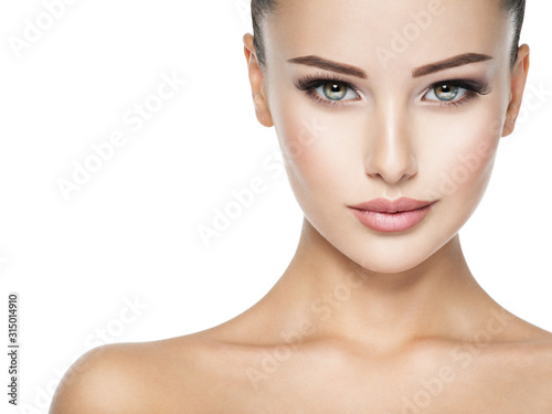 Beautiful face of young woman with  health fresh skin