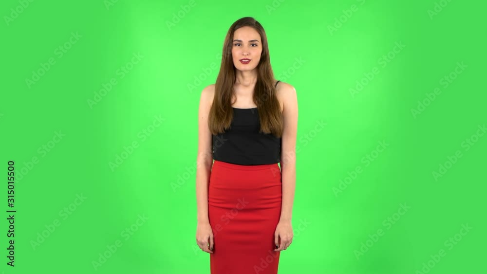 Cute female looking with excitement, then celebrating her victory triumph. Green screen Cute female looking with excitement, then celebrating her victory triumph. Green screen