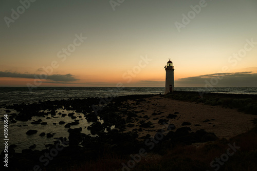 Lighthouse at a colorful sunrise