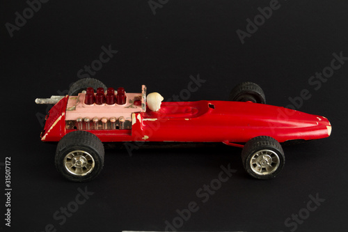 old USSR race car isolated on black