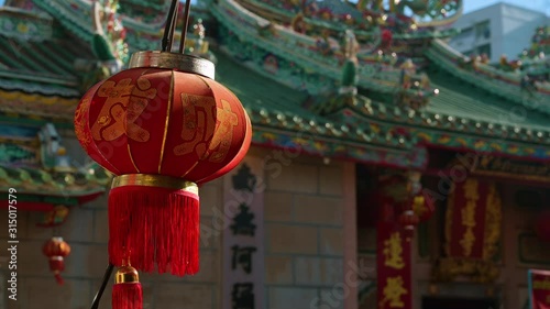 Chinese new year lanterns with blessing text mean happy health and wealth at china temple with 4K resolution. Asian style background.
