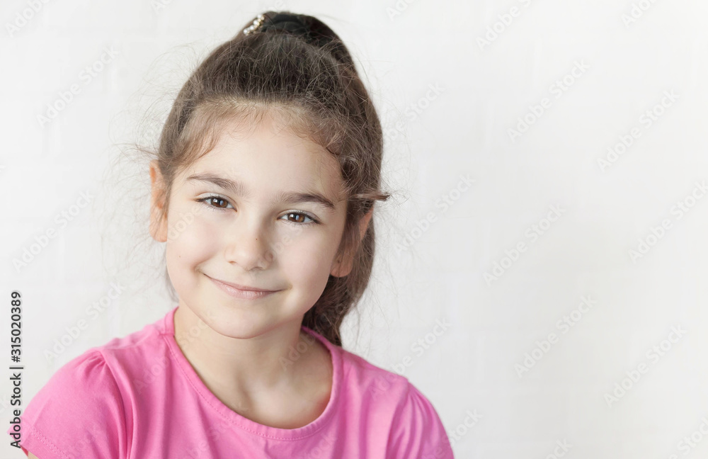 Portrait of happy smiling child girl isolated on white background. Laughing people. Positive emotions. Portrait of happy smiling child girl isolated on white background. Laughing people. Positive emotions.