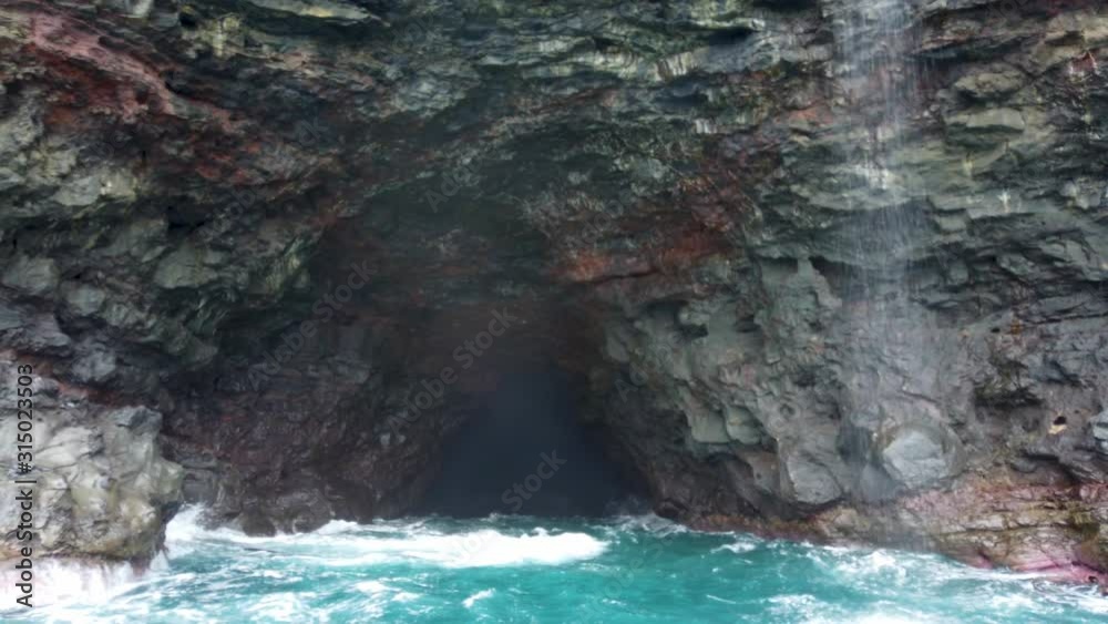4K Hawaii Kauai Boating on ocean floating right to left near waterfall and cave 4K Hawaii Kauai Boating on ocean floating right to left near waterfall and cave
