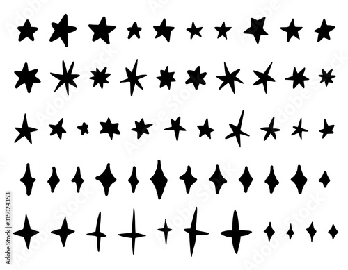 Doodle star set. Hand drawn vector stars and sparkles symbols