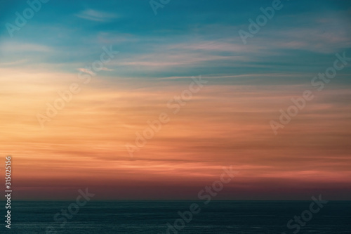 View of colorful sunset over Tasman sea © Emagnetic