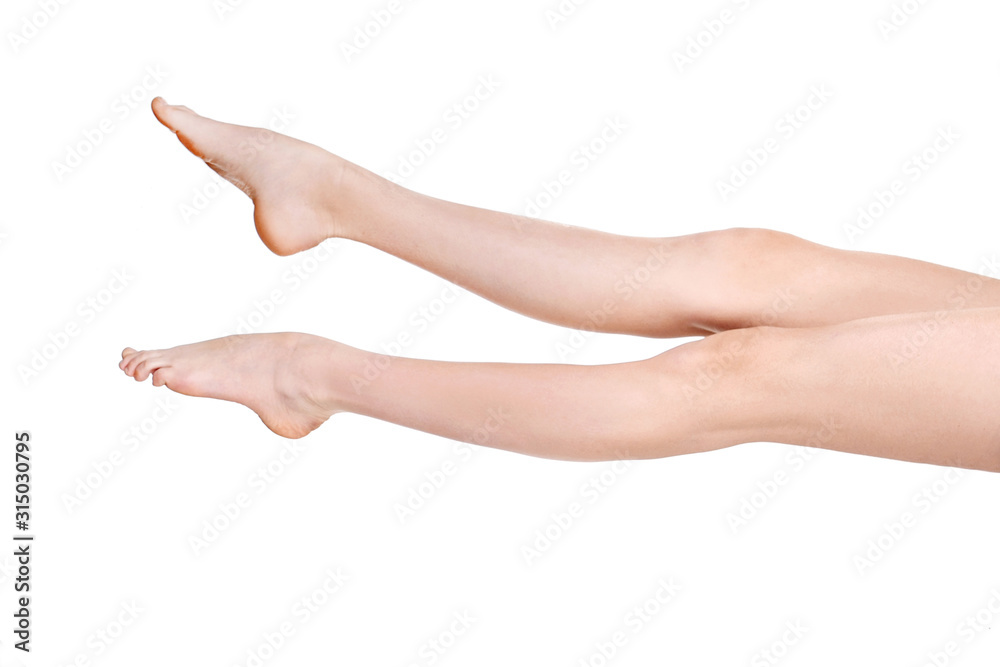 female legs on a white background in studio