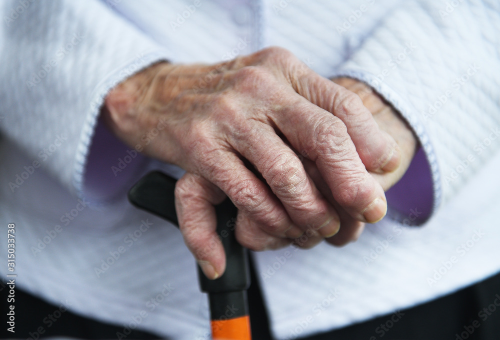 Φωτογραφία Hands of a mature wife or guardian holding the hands of her elderly woman or patient, as an expression of care and support