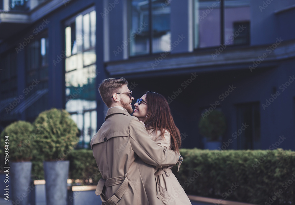 Happy couple in love outdoor. Outdoor portrait of stylish fashion couple