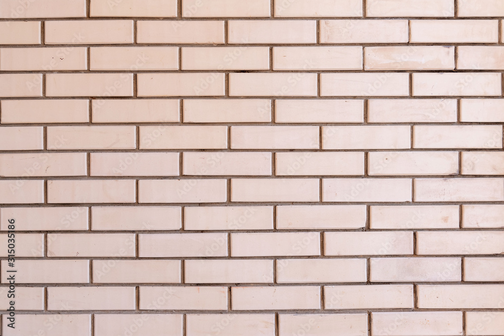 Brick wall in the form of a background with a copy of the space Brick wall in the form of a background with a copy of the space