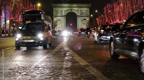 night footage of arc de triumph famous landmark in place de l’étoile champs élysées paris France 50fps footage photo