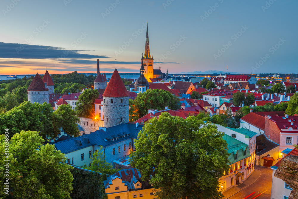 Panoramic aerial view of Tallinn old city center. Estonia. Summer late evening.