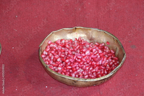 Pomogranate in basket photo
