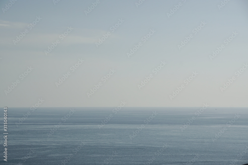 Tranquil scene of horizon seascape blue sea with clearly sky at phuket thailand - Blue gradient nature Backdrop background Tranquil scene of horizon seascape blue sea with clearly sky at phuket thailand - Blue gradient nature Backdrop background