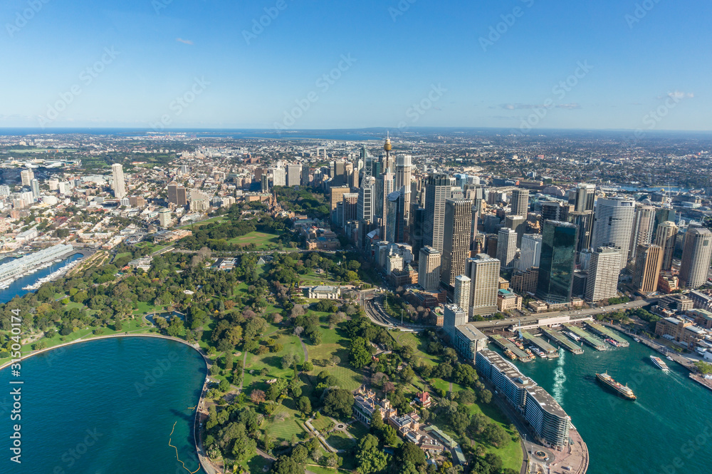 Aerial view of Sydney Royal Botanic Garden public garden and skyscrapers of CBD