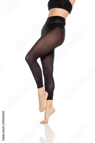 Young woman's legs with nylon tights