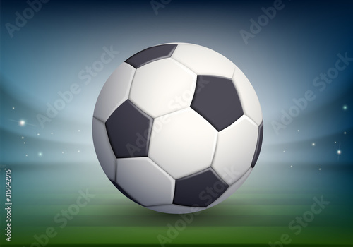 Soccer ball on the night field of the stadium