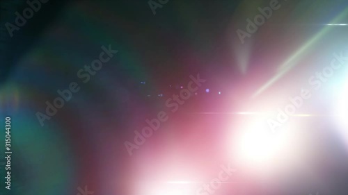 Lens flare light and bright glow over black background. Overlay filter