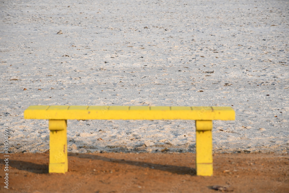 Yellow Bench for Waiting at White Dessert, White Run, Dhordo, Kutch, Gujarat, India Yellow Bench for Waiting at White Dessert, White Run, Dhordo, Kutch, Gujarat, India