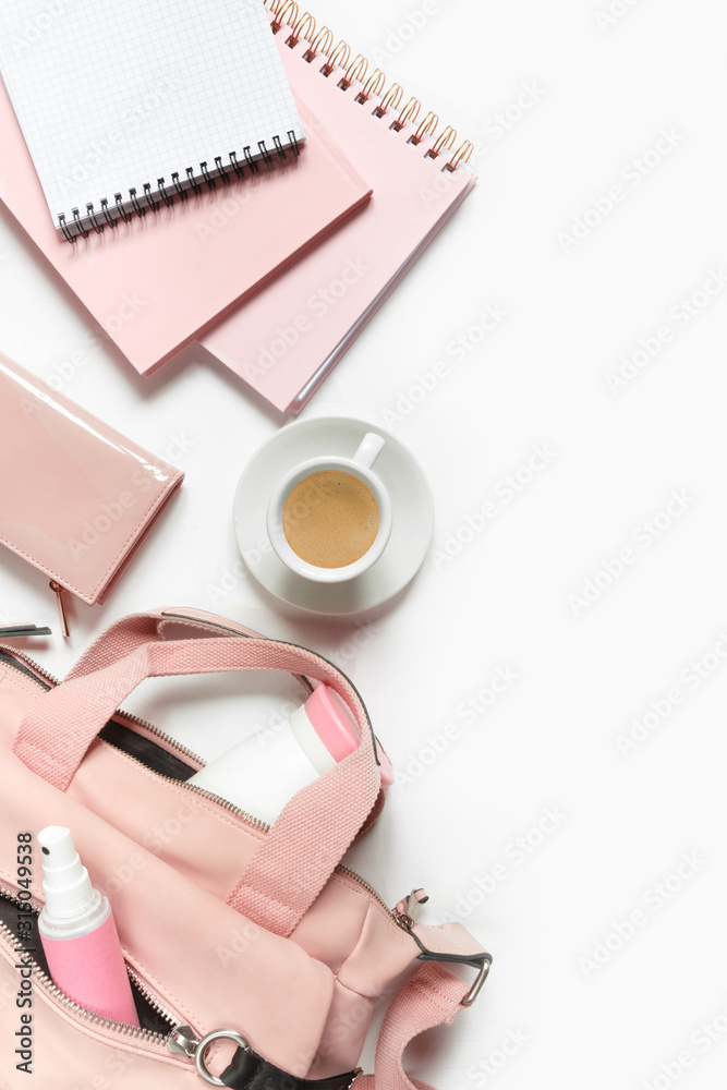 Flat lay, Women's accessories pink backpack, glider, water bottle and spray for the face on a white background, trend things girl generation z, fashion background Flat lay, Women's accessories pink backpack, glider, water bottle and spray for the face on a white background, trend things girl generation z, fashion background