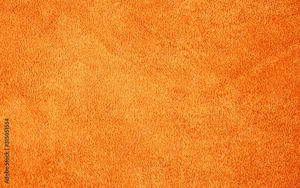 Fototapeta premium Suede leather. Genuine leather material. Brown background. Beige background. Skin testure. Suede.