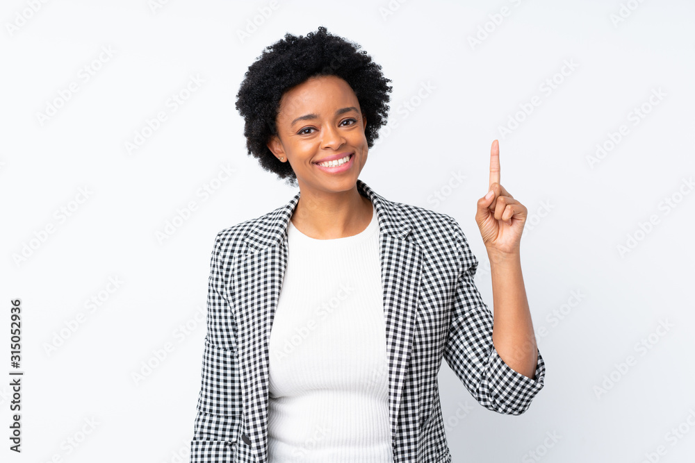 African american woman with blazer over isolated white background showing and lifting a finger in sign of the best African american woman with blazer over isolated white background showing and lifting a finger in sign of the best